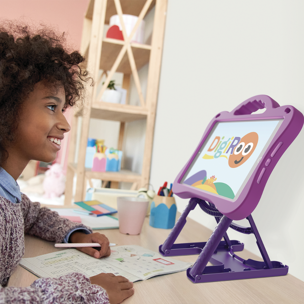 Child using purple ipad case that also has a stand to help prevent tech neck.